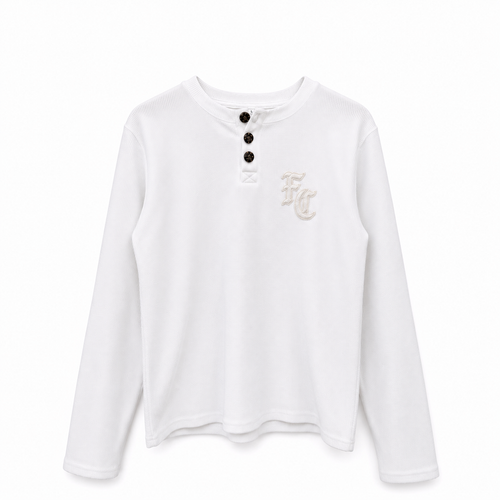 A white long-sleeve henley shirt with three black buttons at the collar and a small beige embroidered 'FC' monogram on the left chest, shown against a plain white background.